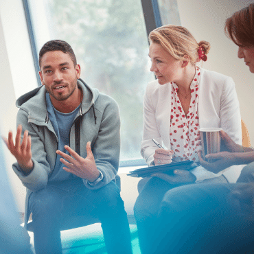 Man talking to woman